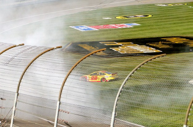 The big winner doing burnouts on the infield